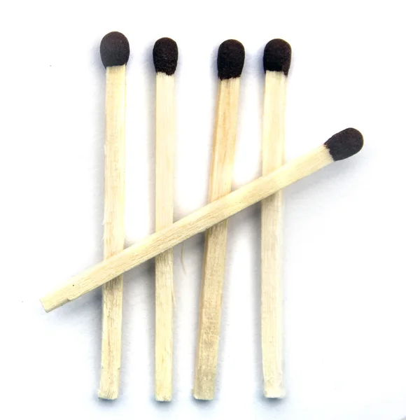 Five ordinary matches on a white background isolated closeup — Stock Photo, Image