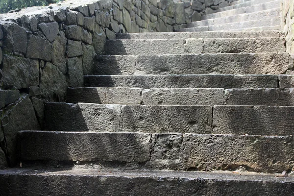 Beautiful old stone stairs natural dark stone diabase with stone — Stock Photo, Image