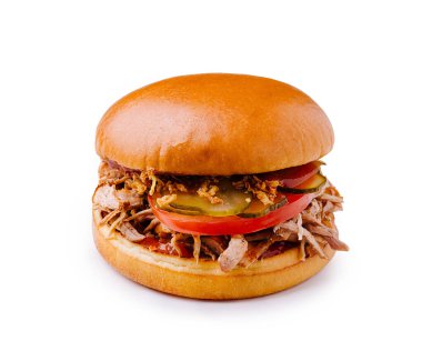 Lezzetli bir domuz sandviçi taze et, çıtır turşu, taze domates ve lezzetli bir sosla her zaman tatmin edici bir yemek için mükemmeldir..