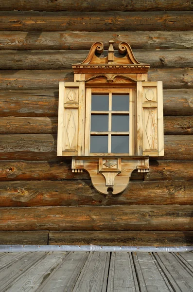 stock image In the Window of a wooden house.