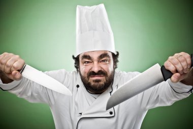 deli vahşi Şef yeşil izole bıçak ile pişirme