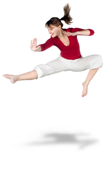 Menina bonita com óculos salto isolado no branco — Fotografia de Stock