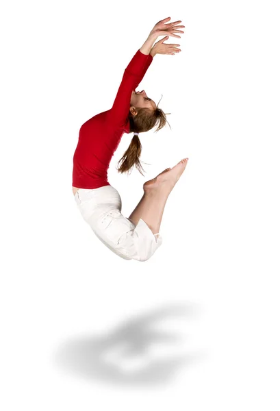Femme heureuse avec des vêtements rouges et blancs sauter isolé sur blanc — Photo