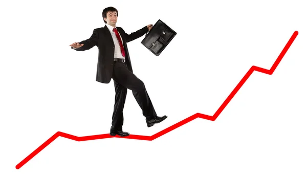 Gráfico de resultados positivos com homem de negócios andando em equilíbrio isolado no branco — Fotografia de Stock