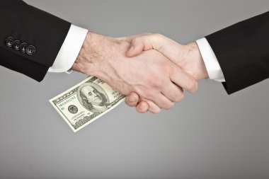  gri izole el sıkışma ile işadamı döviz para