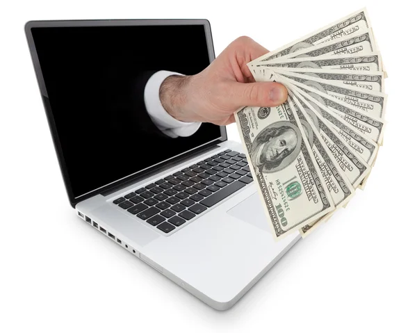 Moderner Laptop mit einer Hand, die hundert Dollar isoliert auf weiß hält — Stockfoto