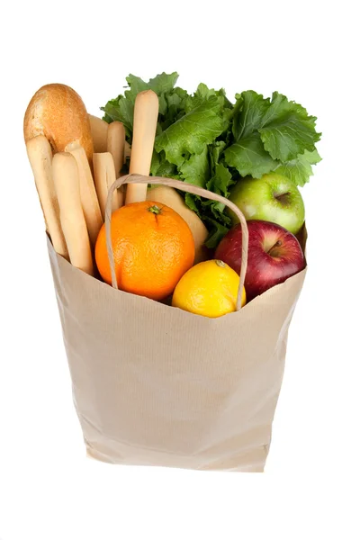 Sac en papier shopping avec pain aux fruits et légumes isolé sur blanc — Photo