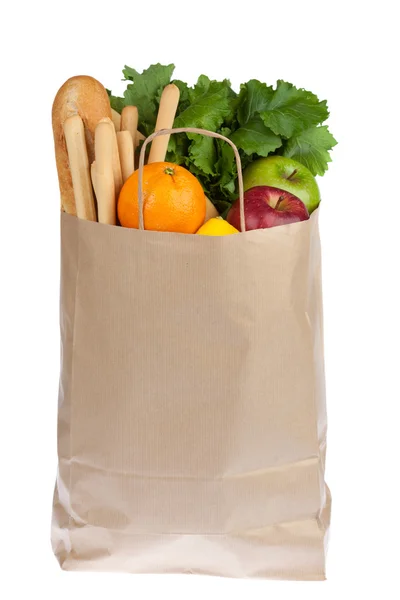 Saco de papel de compras com pão vegetal de frutas isolado em branco — Fotografia de Stock