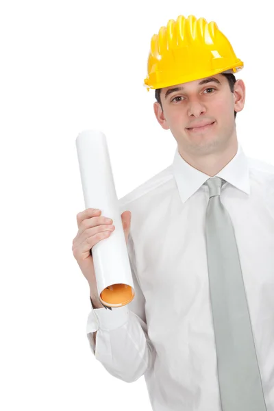 Hermoso joven ingeniero con plan de construcción y casco aislado en blanco —  Fotos de Stock