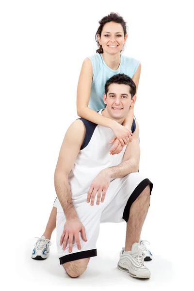 Młoda para piękny czy fitness razem na białym tle — Zdjęcie stockowe