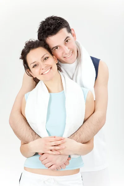 Młoda para piękny czy fitness razem na białym tle — Zdjęcie stockowe