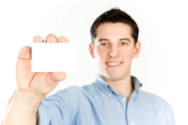 Young beautiful happy man hold business card isolated on white Stock Photo