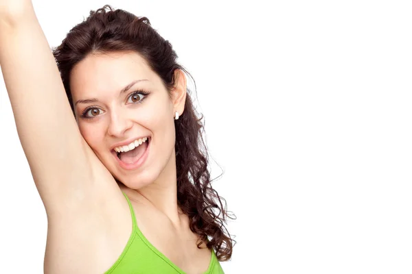 Beautiful young brunette girl with arm up isolated on white — Stock Photo, Image