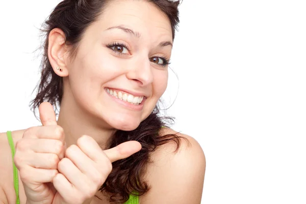 Bela jovem morena menina sorriso polegares para cima isolado no branco — Fotografia de Stock