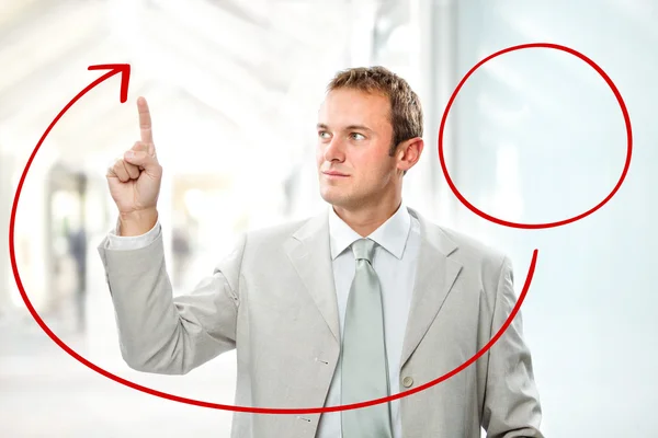 Handsome businessman draw chart with hand at office — Stock Photo, Image