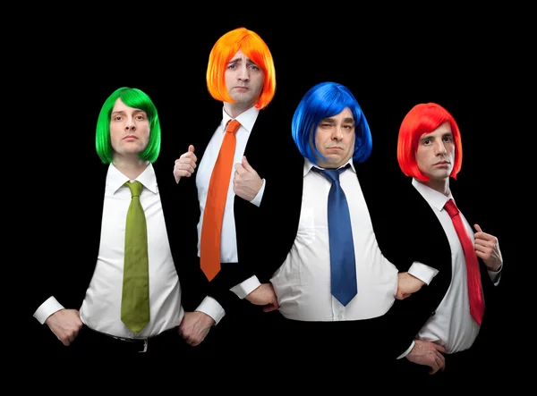 Ομάδα του επιχειρηματία με multi χρωματιστά ισοπαλία και τα μαλλιά περούκα απομονώνονται σε μαύρο — Φωτογραφία Αρχείου
