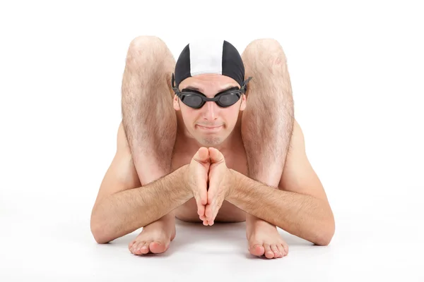 Gorra de nadador flexible contorsionista googles en preparación para bucear aislado en blanco — Foto de Stock