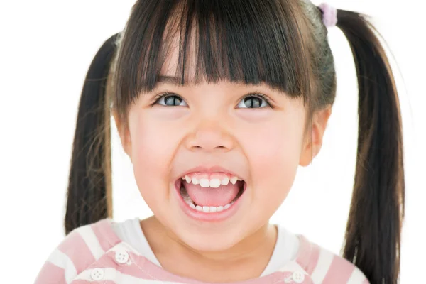 Asiático sonriente niña con pigtail aislado en blanco — Foto de Stock