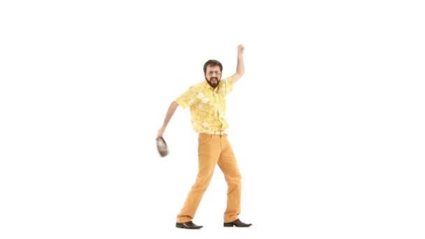 Young man dressing in 70s yellow-orange vintage clothes and hat  making movements — Stock Video