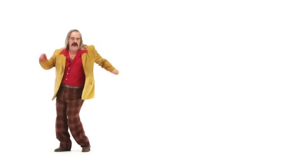 Middle-age man dressing in 70s clothes making movements — Stock Video