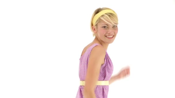 Young blonde girl wearing purple clothes — Stock Video