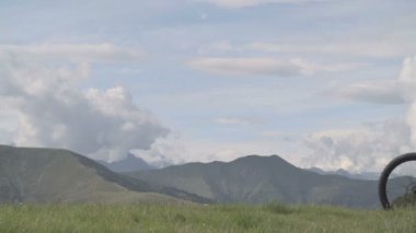 Young athletic man in summer day is enjoying the panorama outdoor