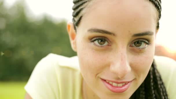 Beautiful young girl with braids — Stock Video