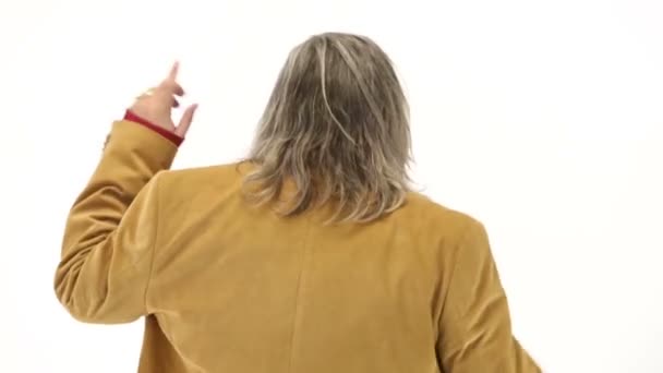 Middle-age man dressing in 70s clothes making movements — Stock Video