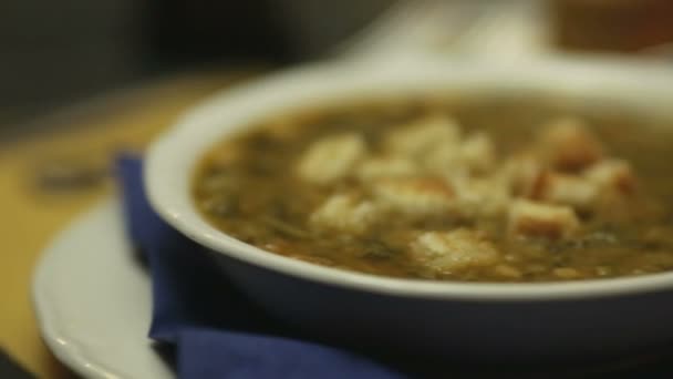 Italian soup with slice of toasted bread — Stock Video
