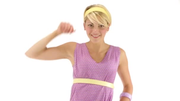 Young blonde girl wearing purple clothes — Stock Video