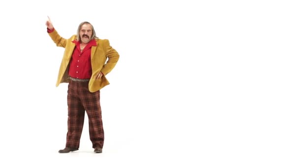 Middle-age man dressing in 70s clothes making movements — Stock Video