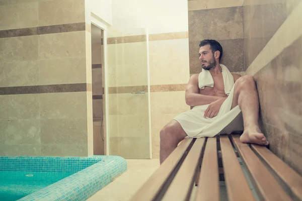 Black beard unressed man relaxing at spa — Stok Foto