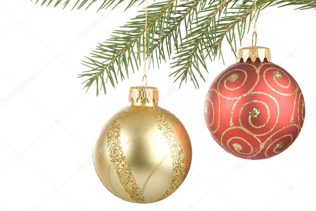 Christmas balls hanging on fir branch
