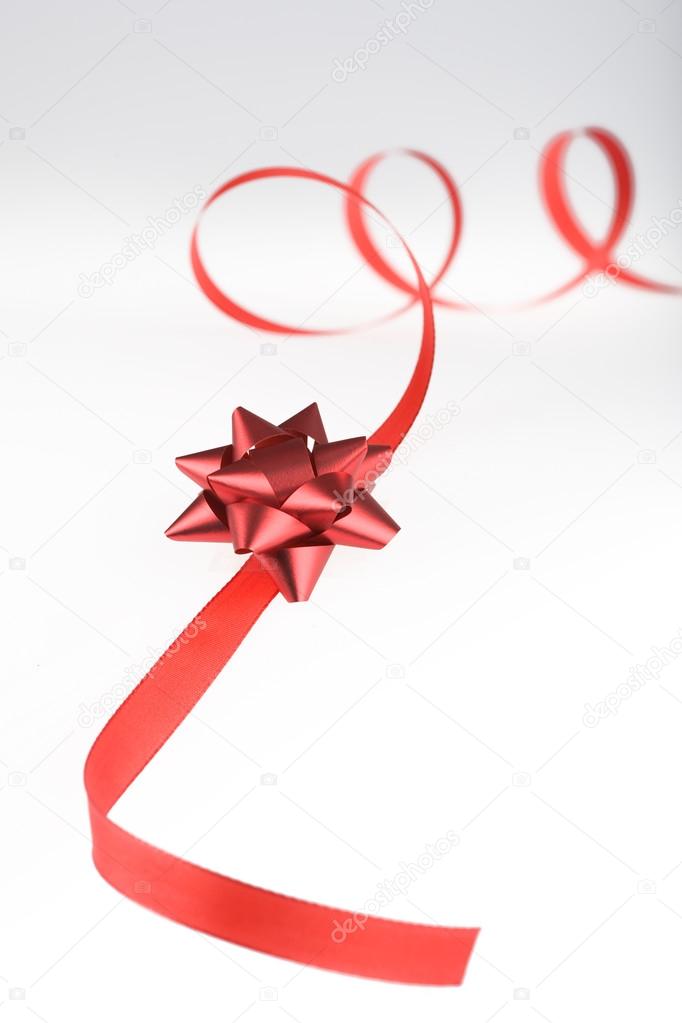 red gift wrap ribbon with bow