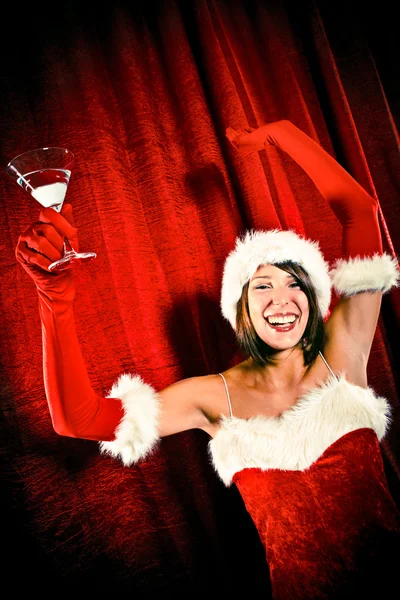 Санта Клаус женщина танцует с коктейлем — стоковое фото