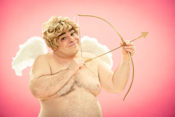 Cupid throws love arrow with his bow for valentine day — Stock Photo, Image