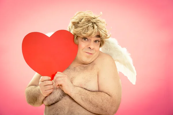 Gelukkig cupid geeft liefde hart voor Valentijn — Stockfoto