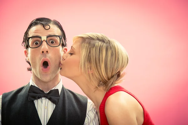 Nerd man boyfriend kissed by his girlfriend love portrait for valentine day — Stock Photo, Image