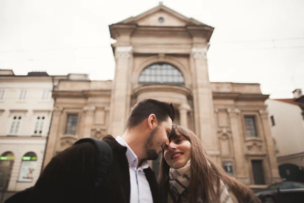Loving couple posing in the old town — Stock Photo, Image