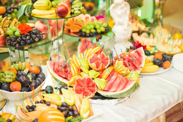 Authentic buffet, assorted fresh fruits, berries and citrus. Preparation for design creative menu Royalty Free Stock Photos