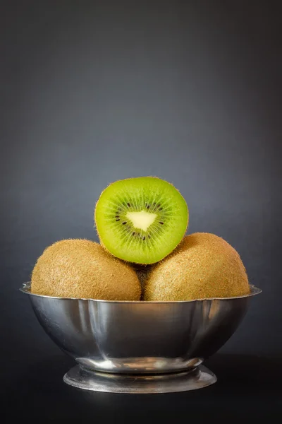 Kiwifruit on dark background — Stock Photo, Image