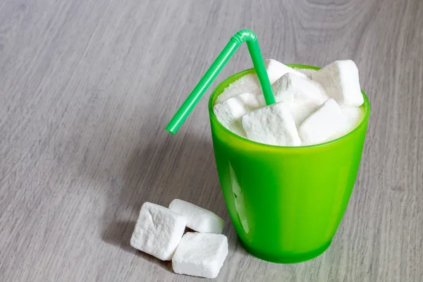 Glass with straw full of sugar — Stock Photo, Image