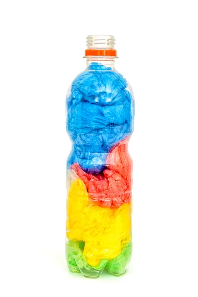 Plastic fles vol met plastic zakken — Stockfoto