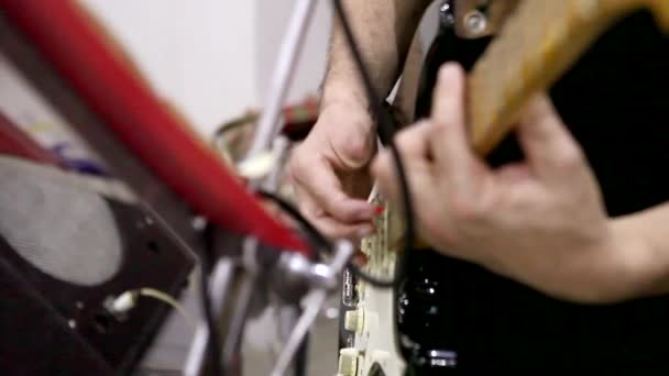 Musician, no one finger on the hand playing the electric guitar — Stock Video