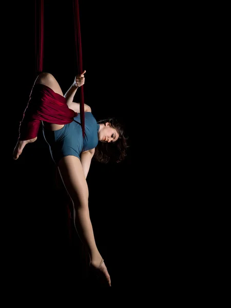 Aerial dancer woman isolated on black — Stock Photo, Image