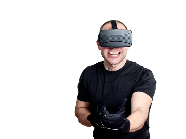 Muž s soupravu pro virtuální realitu hraje videohry — Stock fotografie