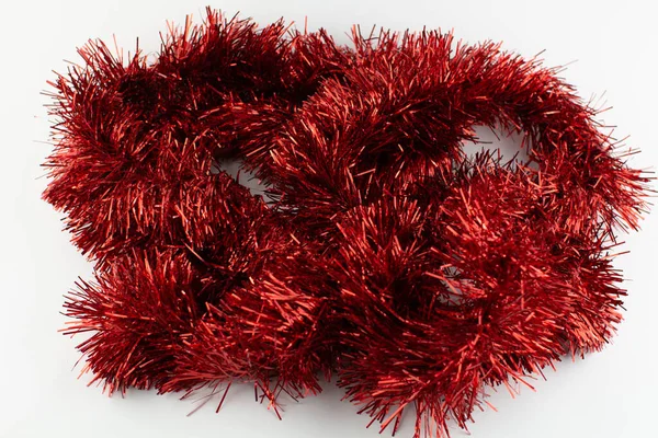 Μια Κόκκινη Γιρλάντα Για Χριστούγεννα Φόντο Διακοπών — Φωτογραφία Αρχείου