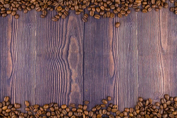 Tahta Bir Masanın Üzerindeki Kahve Çekirdeğinden Yapılmış Bir Çerçeve — Stok fotoğraf