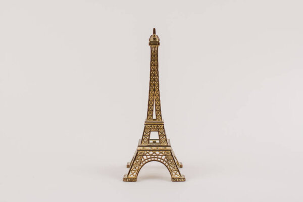 a souvenir eiffel tower on white background