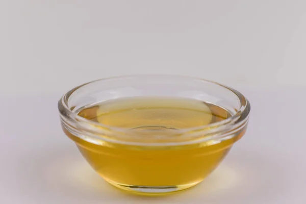 Szklana Miska Świeżym Złotym Miodem Płynnym — Zdjęcie stockowe